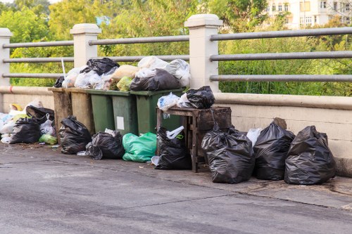 Team members offering residential and commercial clearance services